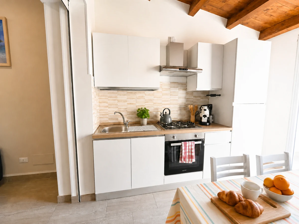 Equipped kitchenette at Grecale apartment