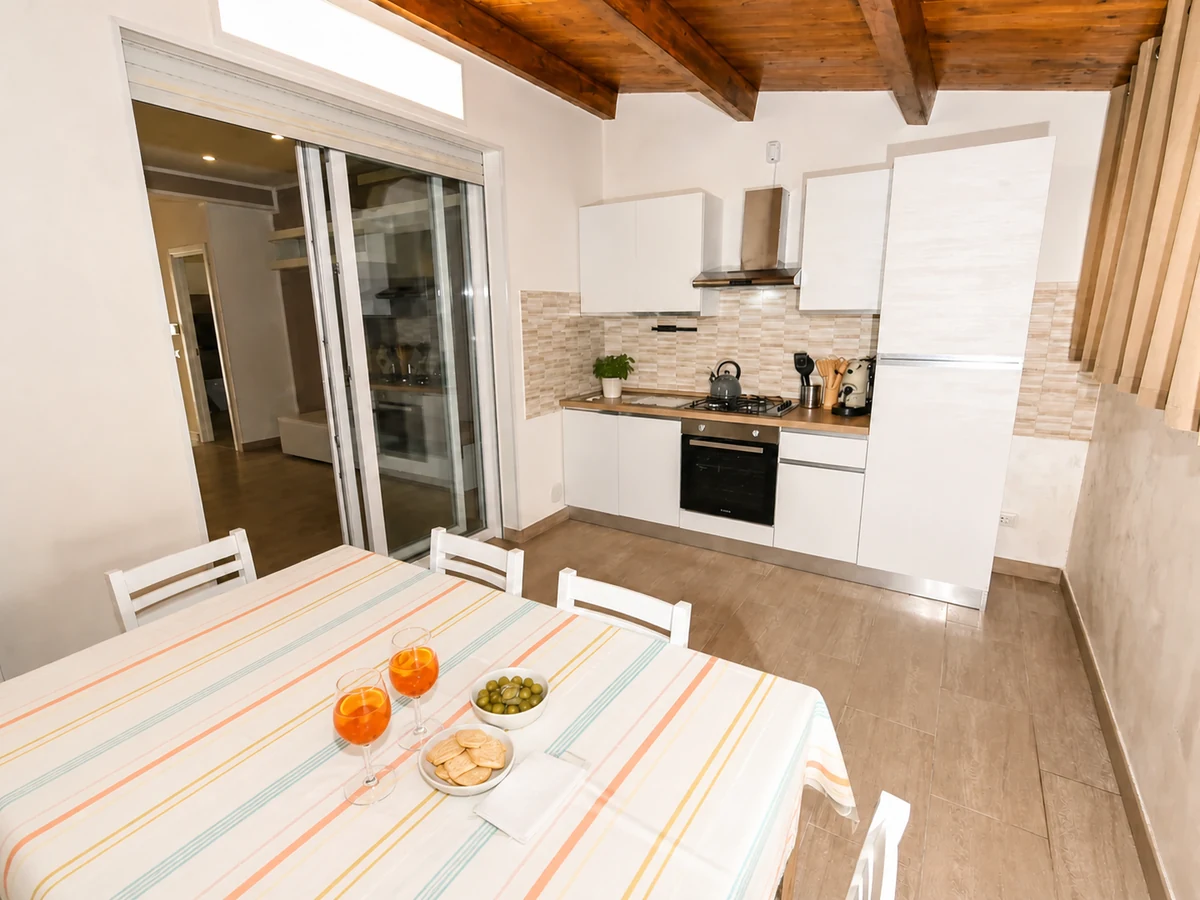 Kitchen and dining table at Levante apartment
